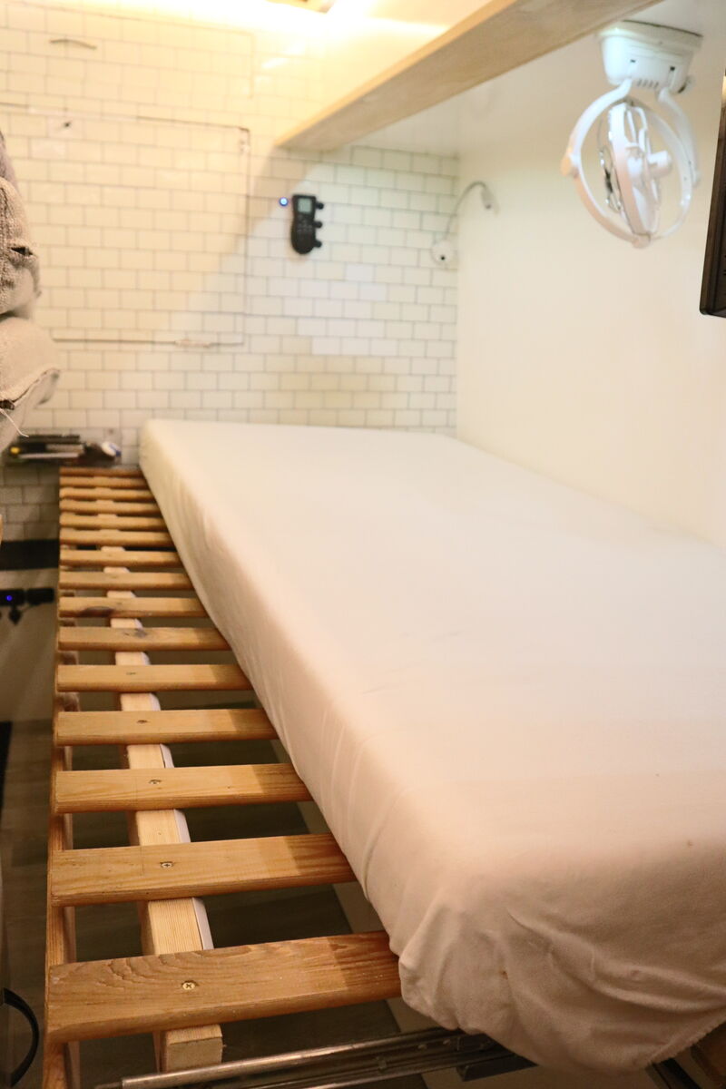 Bed with mattress laid out